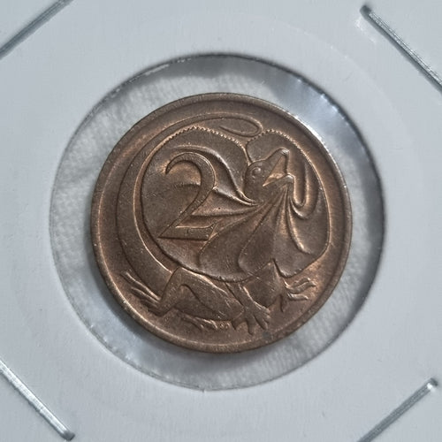1980 Uncirculated Two Cent Coin in 2X2 holder