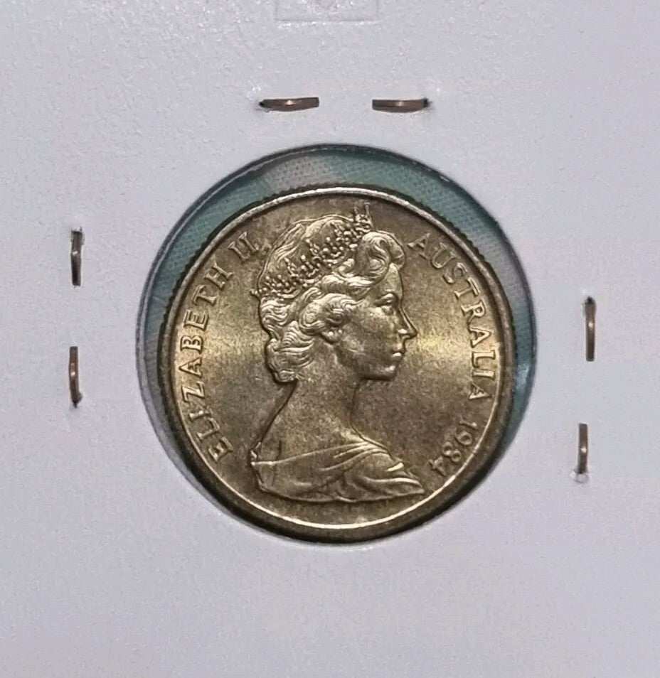1984 UNC $1 Coin in 2x2 One Dollar