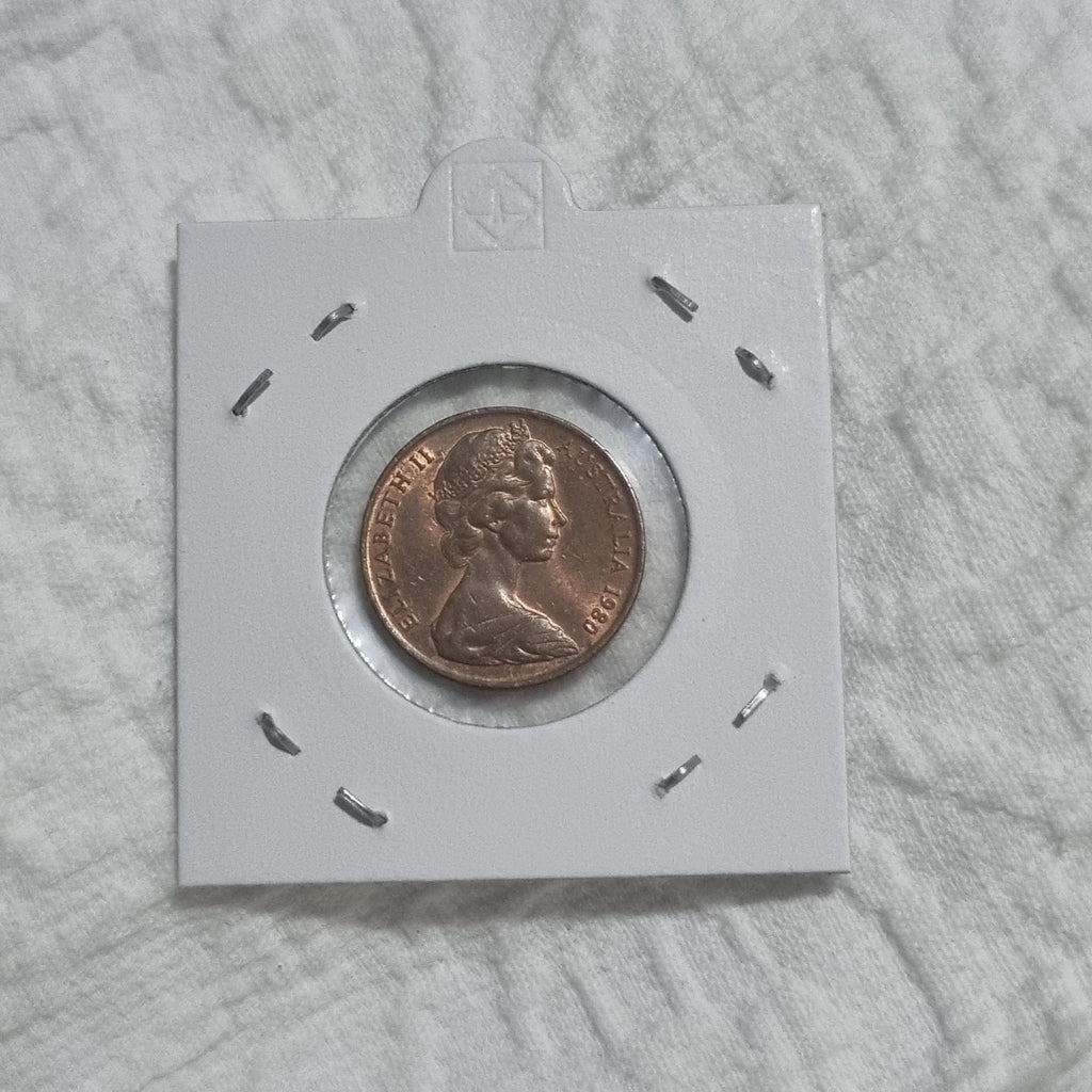 1980 Uncirculated Two Cent Coin in 2X2 holder