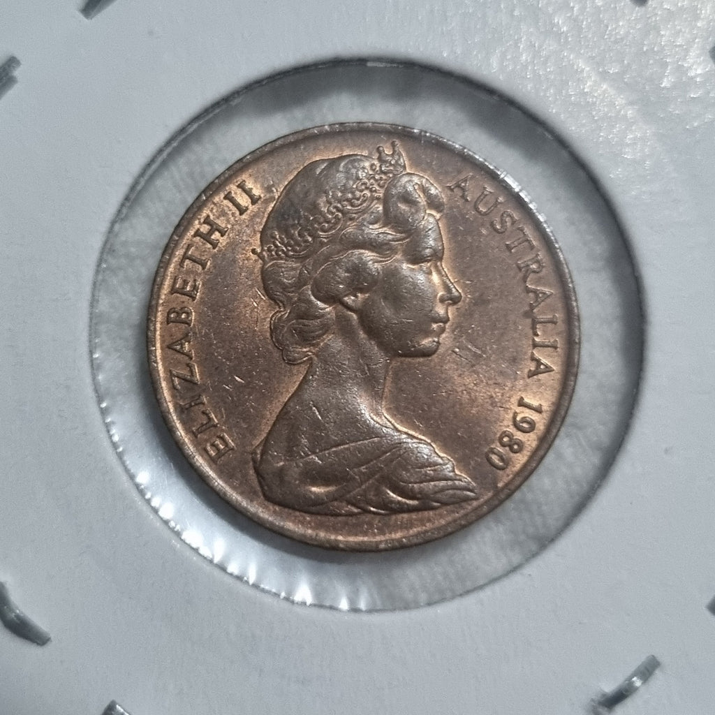1980 Uncirculated Two Cent Coin in 2X2 holder