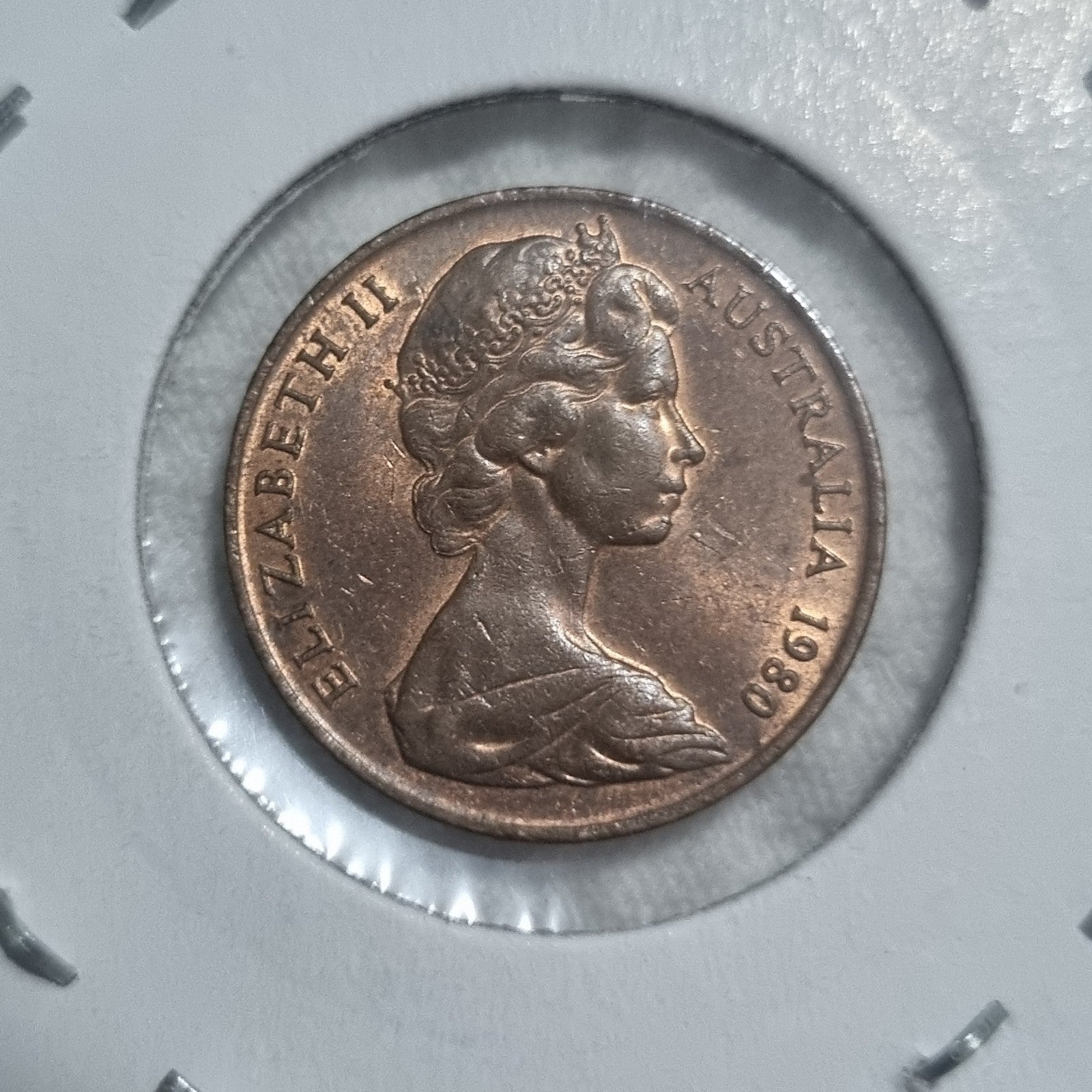 1980 Uncirculated Two Cent Coin in 2X2 holder