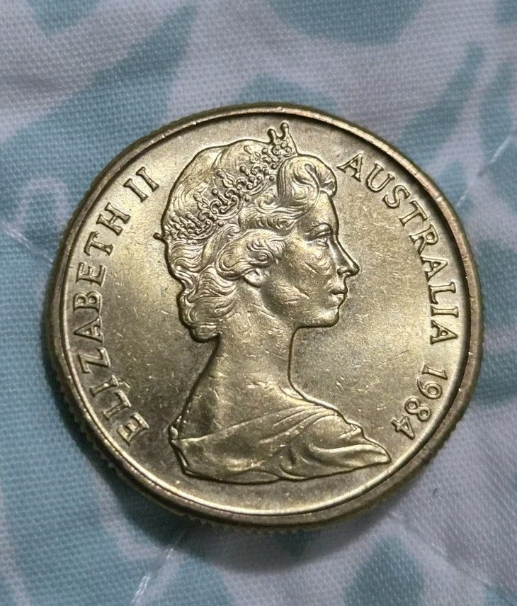 1984 UNC $1 Coin in 2x2 One Dollar