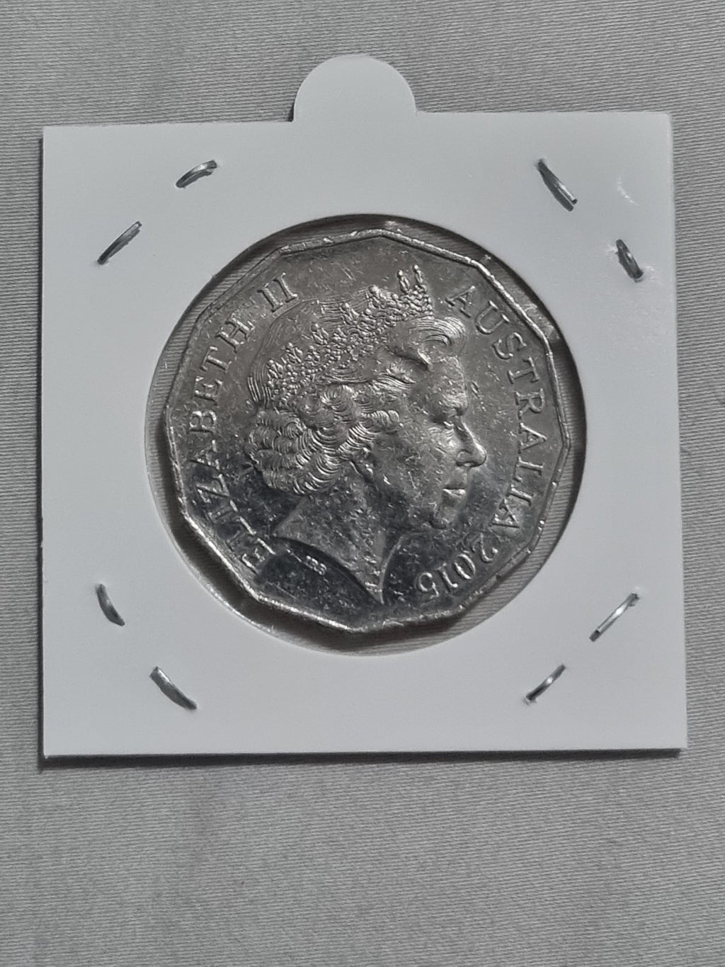 2015 50 Cent Coin - Lightly Circulated In 2x2 Holder 