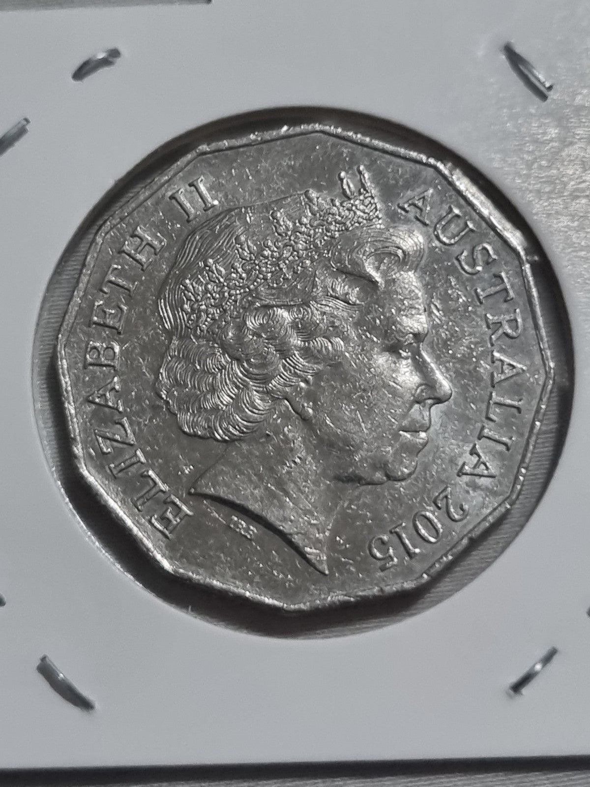 2015 50 Cent Coin - Lightly Circulated In 2x2 Holder 