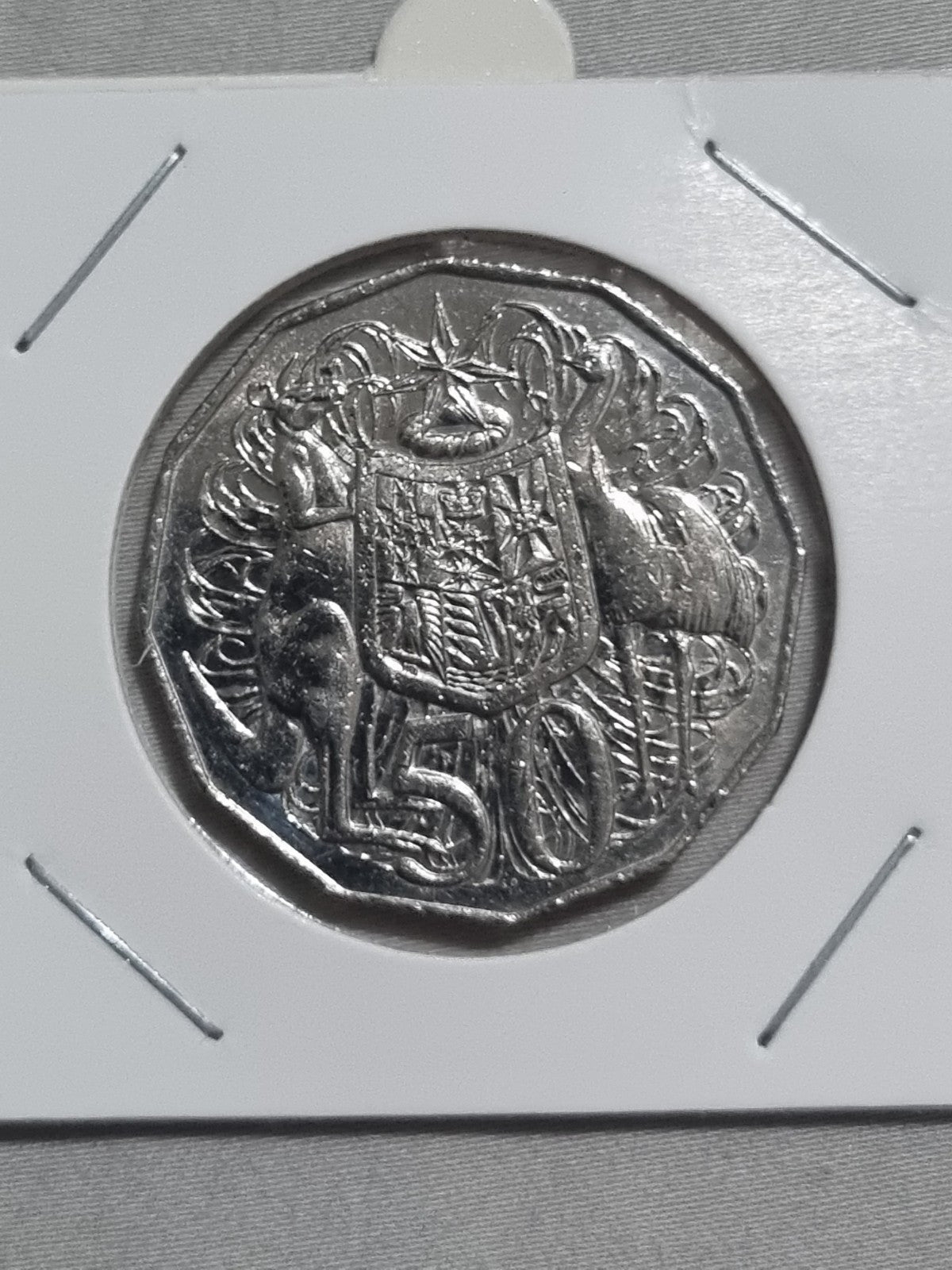 2015 50 Cent Coin - Lightly Circulated In 2x2 Holder 